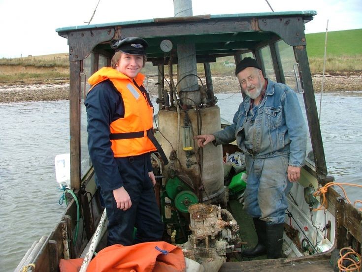 Johnnie and Alistair aboard steamboat Nellie